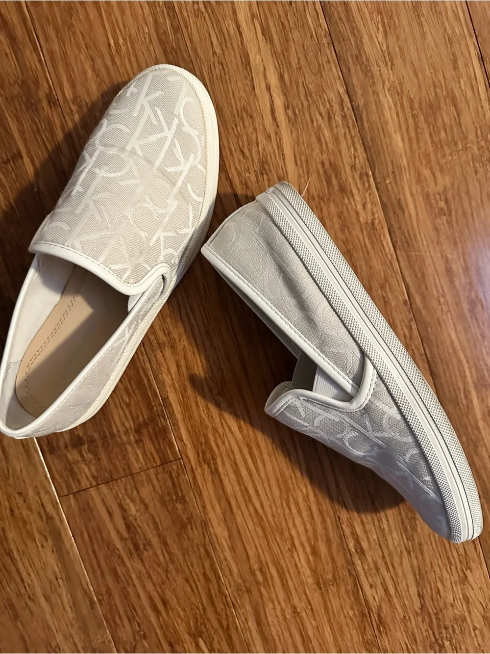 Calvin Klein Off-White Logo Slip-On Sneakers - Picture 6 of 8